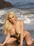 Wild Blonde Spencer Scott Is Posing And Teasing Us In Her Golden Swimsuit Outdoors